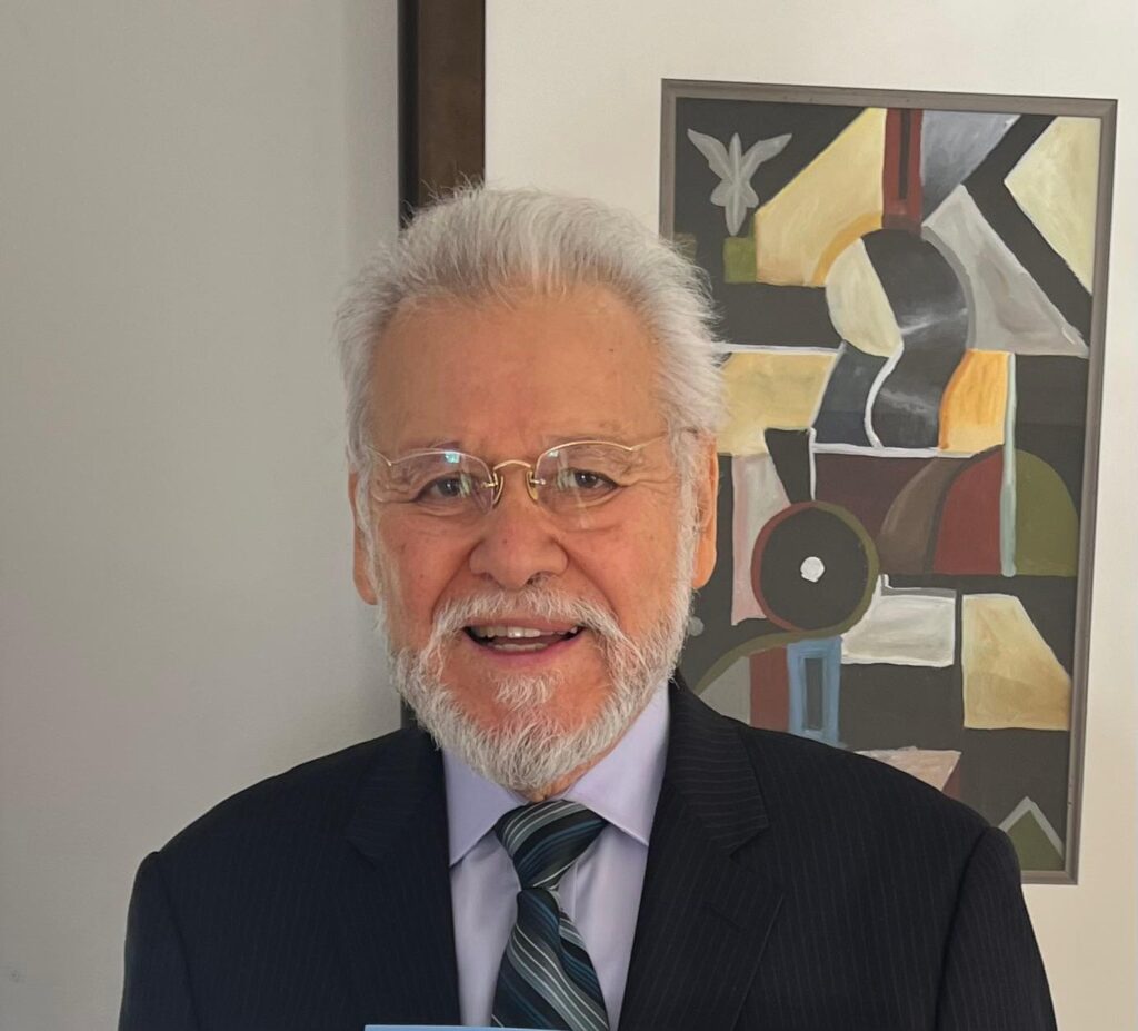 Dr. Carlos E. Vela